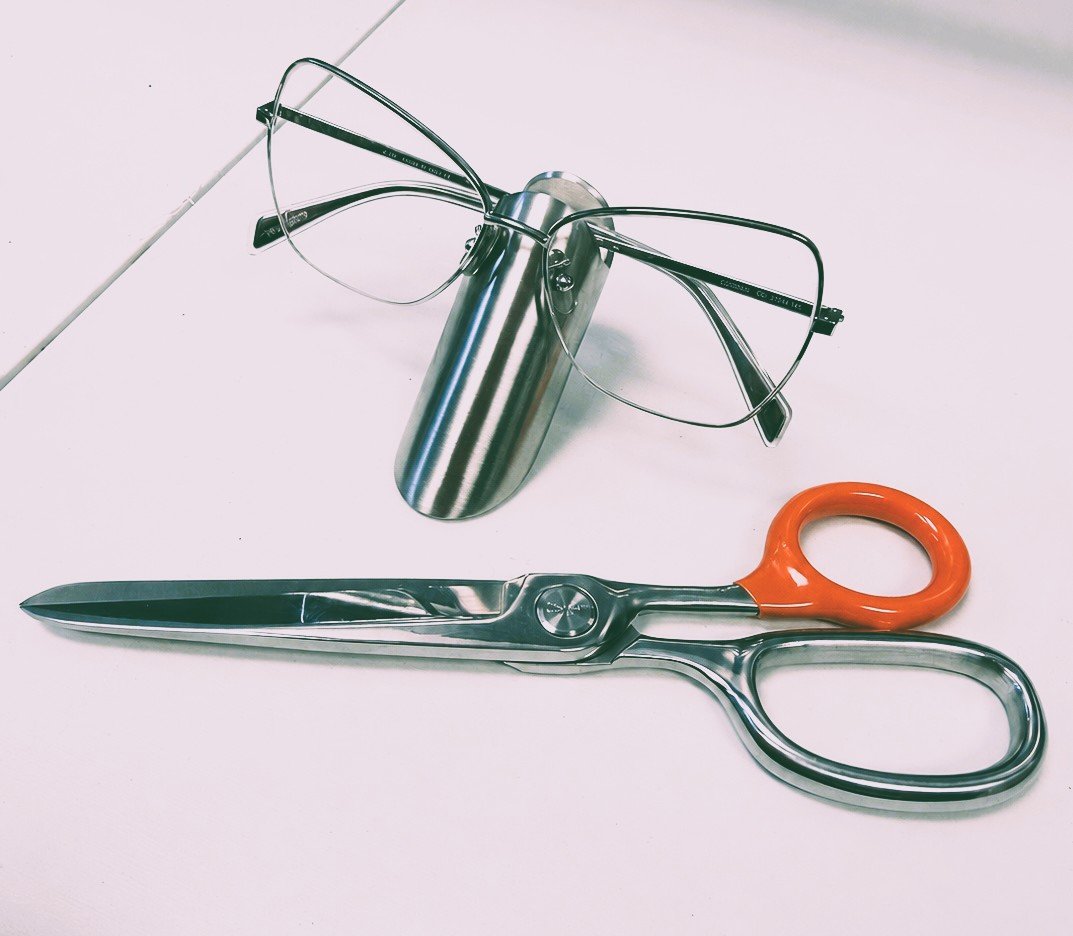 Craighill stainless steel glasses case and orange-handled scissors